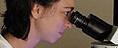 Sabina looking at a parasite
